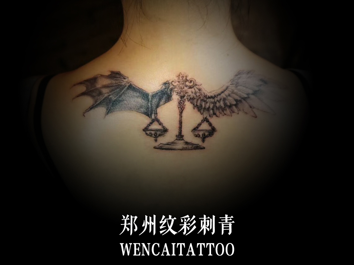 郑州天秤座妹子吉小姐的设计天使与恶魔纹身图案
